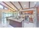 Modern kitchen featuring an island with granite countertops, stainless steel appliances, and ample storage at 4810 Centerbrook Ct, Tampa, FL 33624