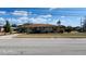 Charming single-story home featuring a well-maintained lawn and a driveway at 5507 Riddle Rd, Holiday, FL 34690