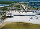 An aerial view of beachside restaurant offering dining with beach access and panoramic waterfront views at 611 Destiny Dr # 604, Ruskin, FL 33570