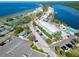 Aerial view of waterfront condo community that offers tennis courts, pool, and private beach access at 611 Destiny Dr # 604, Ruskin, FL 33570