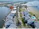 Aerial view of building and pool area with surrounding residential neighborhood at 611 Destiny Dr # 604, Ruskin, FL 33570