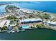 Beautiful aerial view of the waterfront property with a pool, beach, and boat dock at 611 Destiny Dr # 604, Ruskin, FL 33570
