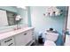 Bright bathroom featuring modern vanity, sink, and mirror at 611 Destiny Dr # 604, Ruskin, FL 33570