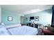 Bright bedroom with two beds, desk and balcony access at 611 Destiny Dr # 604, Ruskin, FL 33570