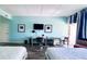 Bright bedroom with two beds, desk and balcony access at 611 Destiny Dr # 604, Ruskin, FL 33570