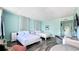 Bright bedroom with two beds, desk and outdoor view at 611 Destiny Dr # 604, Ruskin, FL 33570
