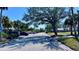 Street view showcasing the community's lush greenery and inviting atmosphere near the playground at 611 Destiny Dr # 604, Ruskin, FL 33570