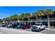 Well maintained condo building with designated parking spaces lined with tropical palm trees offering a true sense of relaxation at 611 Destiny Dr # 604, Ruskin, FL 33570
