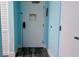 Hallway showcasing a secure entrance with keycard access for added security and peace of mind at 611 Destiny Dr # 604, Ruskin, FL 33570