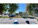 Enjoy this street view with beautiful landscaping, palm trees, and community pool that is within walking distance to your new home at 611 Destiny Dr # 604, Ruskin, FL 33570