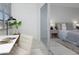 Balcony with a desk, chair, and views into the Primary bedroom at 7321 Central Ave # 402, St Petersburg, FL 33710