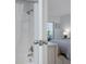 Bathroom shower and bedroom view featuring modern shower head and neutral tones at 7321 Central Ave # 402, St Petersburg, FL 33710