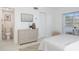 Bedroom showcasing the neutral decor, closet and light-filled, airy ambiance at 7321 Central Ave # 402, St Petersburg, FL 33710
