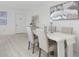 Bright dining room with neutral tones and stylish furnishings at 7321 Central Ave # 402, St Petersburg, FL 33710