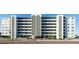 Multi-story building featuring private balconies and well-maintained landscaping at 7321 Central Ave # 402, St Petersburg, FL 33710