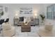 A stylish living room with coordinated furniture and decor at 7321 Central Ave # 402, St Petersburg, FL 33710