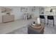 Open-concept living area blending kitchen, dining, and living spaces with elegant furnishings at 7321 Central Ave # 402, St Petersburg, FL 33710