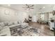 Bright and open living space featuring modern furnishings and a cozy atmosphere at 7673 Yale Harbor Dr, Wesley Chapel, FL 33545