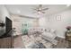 Cozy living room features a large sectional and stylish decor at 7673 Yale Harbor Dr, Wesley Chapel, FL 33545