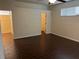 Bedroom featuring tile flooring, closet, and access to en-suite bathroom at 8019 Brien Green Way, Temple Terrace, FL 33637