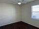 Bedroom featuring hard wood floors, ceiling fan and natural light at 8019 Brien Green Way, Temple Terrace, FL 33637