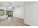 Bedroom with vaulted ceilings, ceiling fan, and closet at 887 Lucas Ln, Oldsmar, FL 34677