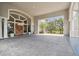 Large covered entrance of the community clubhouse with decorative doors at 887 Lucas Ln, Oldsmar, FL 34677