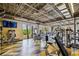Well-equipped gym with various machines, large windows, and a bright, open space at 887 Lucas Ln, Oldsmar, FL 34677