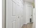 Hallway with closets and wood flooring at 887 Lucas Ln, Oldsmar, FL 34677