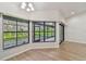 Living Room With lots of windows and view out to the screened porch at 887 Lucas Ln, Oldsmar, FL 34677