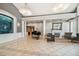 Elegant lobby with tiled floors, columns, a fireplace, a piano, and comfortable seating area at 887 Lucas Ln, Oldsmar, FL 34677