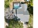 Aerial view of house with screened in pool and tree coverage at 8979 Hernando Way, Weeki Wachee, FL 34613