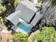 Aerial view of home featuring a screened in pool and patio at 8979 Hernando Way, Weeki Wachee, FL 34613