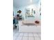 Full bathroom featuring a built-in tub, tile floor, and stylish nautical decorations at 8979 Hernando Way, Weeki Wachee, FL 34613