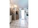Bathroom featuring a glass enclosed shower with coastal decorations at 8979 Hernando Way, Weeki Wachee, FL 34613