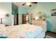Bedroom features a white dresser, decor and a ceiling fan at 8979 Hernando Way, Weeki Wachee, FL 34613