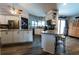 Open kitchen featuring granite countertops, stainless steel appliances, and lots of natural light at 8979 Hernando Way, Weeki Wachee, FL 34613