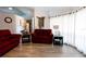 Inviting living room with laminate floors, a comfortable sofa, and stylish nautical decor at 8979 Hernando Way, Weeki Wachee, FL 34613
