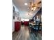 Inviting open concept design with dining area flowing into the living room, perfect for entertaining guests at 8979 Hernando Way, Weeki Wachee, FL 34613