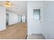 A bright and open-concept living room features neutral carpet and great natural light, creating a welcoming atmosphere at 10022 Lily N St # N, Pinellas Park, FL 33782