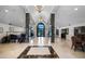 Grand foyer with marble floors, soaring ceilings, and elegant chandeliers at 10263 Gandy N Blvd # 209, St Petersburg, FL 33702