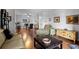Inviting living space with wood floors, a blend of modern and traditional furnishings, and an open layout at 10263 Gandy N Blvd # 209, St Petersburg, FL 33702