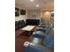 Movie theater room featuring leather seating, a large flatscreen, and a decorative coffee table at 10263 Gandy N Blvd # 209, St Petersburg, FL 33702