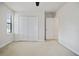 Bright bedroom with a closet and door to the bathroom at 11008 Tahiti Isle Ln, Tampa, FL 33647