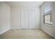 Bedroom with a large closet and a window with blinds at 11008 Tahiti Isle Ln, Tampa, FL 33647