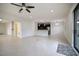 Spacious living room features tile floors, recessed lighting and an open concept design at 11008 Tahiti Isle Ln, Tampa, FL 33647