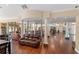 Expansive community lounge area with comfortable seating, hardwood floors, and ample space for relaxing at 11008 Tahiti Isle Ln, Tampa, FL 33647