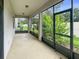 Covered, screened-in patio offers a seamless indoor/outdoor living experience at 11008 Tahiti Isle Ln, Tampa, FL 33647