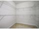 Empty walk-in closet has metal shelving at 11008 Tahiti Isle Ln, Tampa, FL 33647