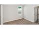 This bedroom features carpet and neutral paint at 12150 Cattleside Dr, Riverview, FL 33579